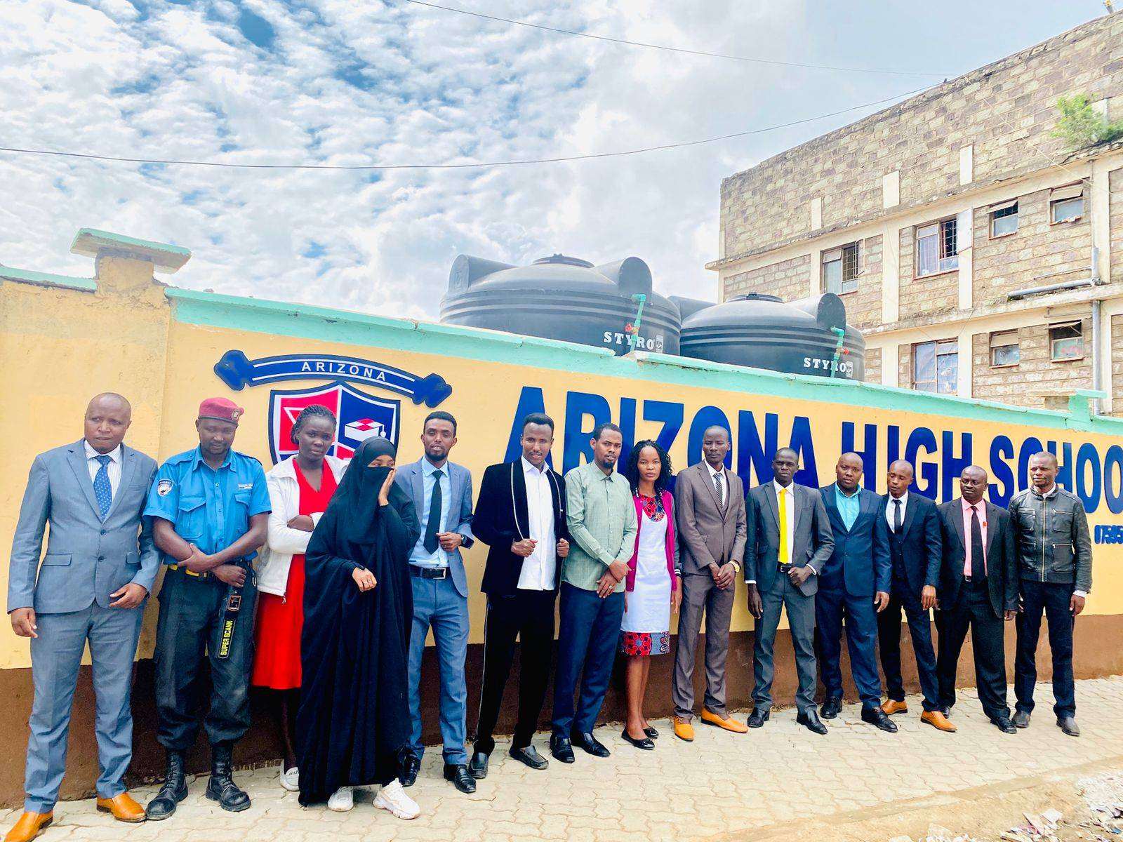 Arizona faculty and staff at the school grounds